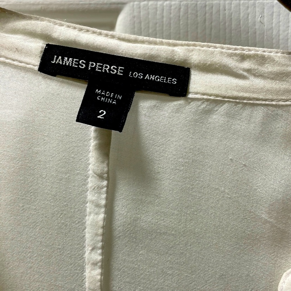 White cotton James Perse bib front blouse.